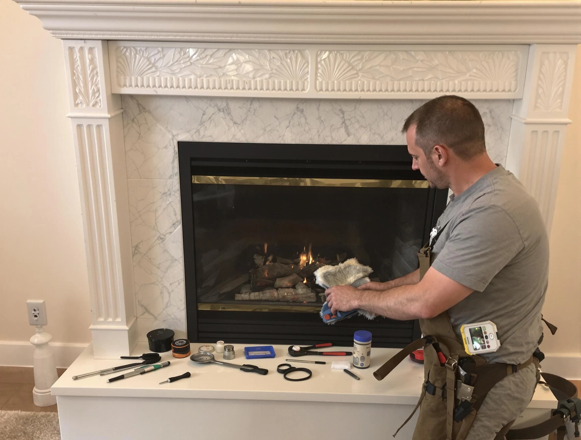 Manalapan Chimney Sweep performing fireplace maintenance in Manalapan, NJ